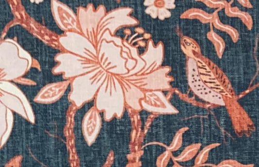 Floral and bird patterned fabric with coral blooms and navy background, ideal for home decor
