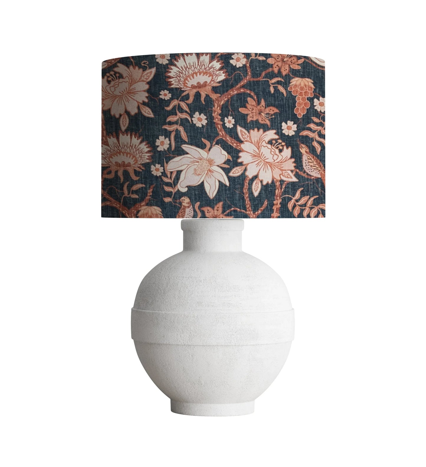 White ceramic table lamp with navy floral lampshade featuring birds and blossoms