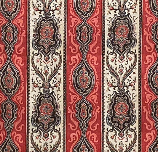 Red and cream ornate rug with intricate floral and paisley patterns, ideal for vintage home decor