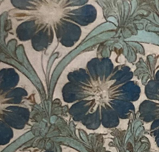 Vintage floral wallpaper with navy blue and teal flowers on cream background
